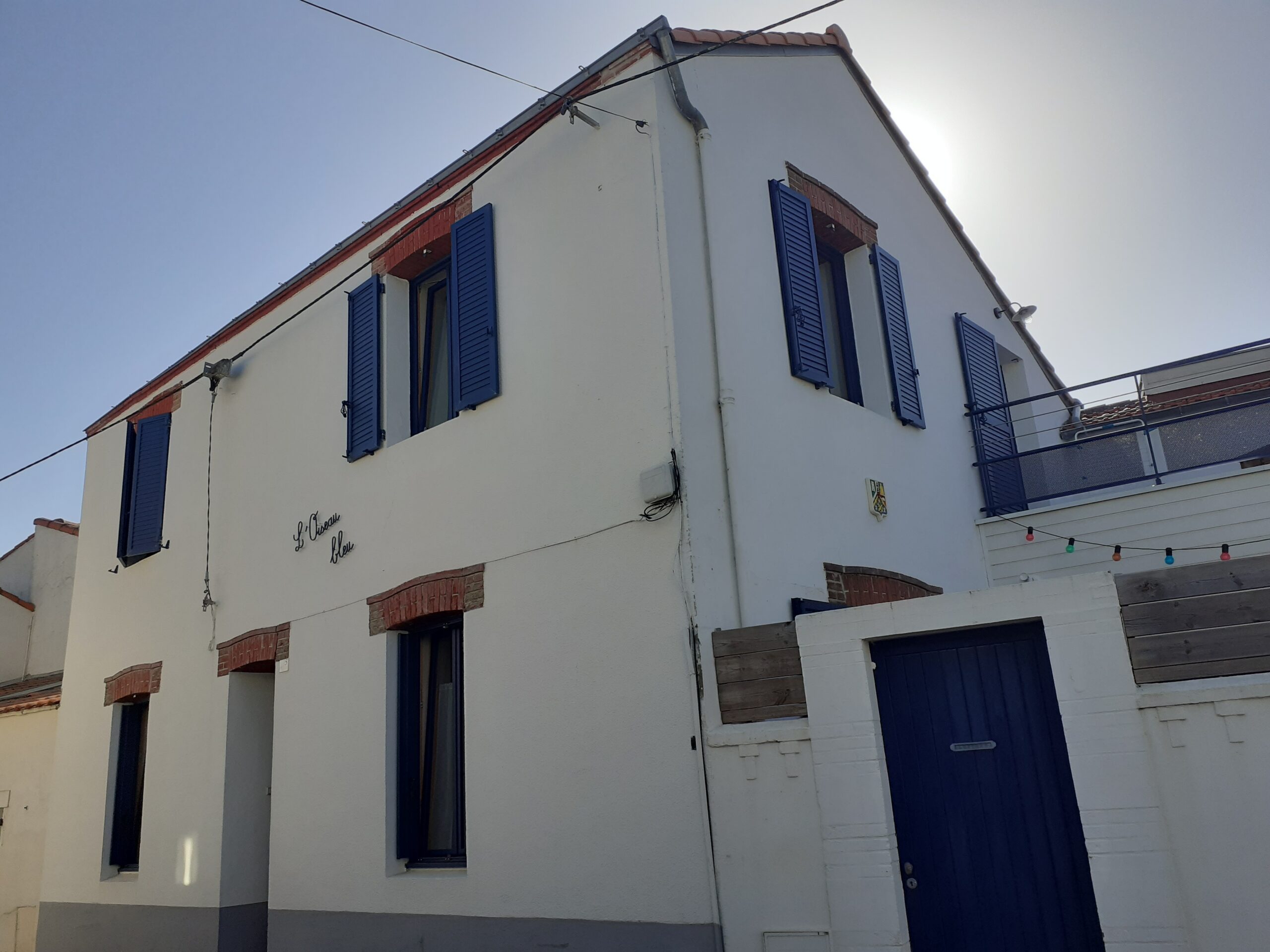 L’Oiseau Bleu Extérieur n°3 Photo représentant une maison